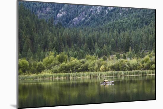 Man Fly-Fishes Out Of His Kayak On Fish Lake Outside Of Conconully, Washington-Hannah Dewey-Mounted Photographic Print