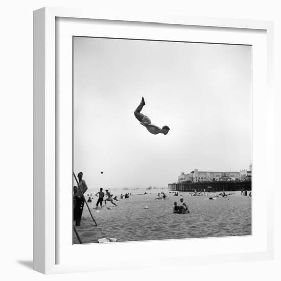 Man Flying Off a Trampoline at Santa Monica Beach-Loomis Dean-Framed Premium Photographic Print