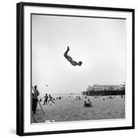 Man Flying Off a Trampoline at Santa Monica Beach-Loomis Dean-Framed Photographic Print