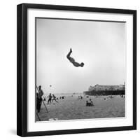 Man Flying Off a Trampoline at Santa Monica Beach-Loomis Dean-Framed Photographic Print