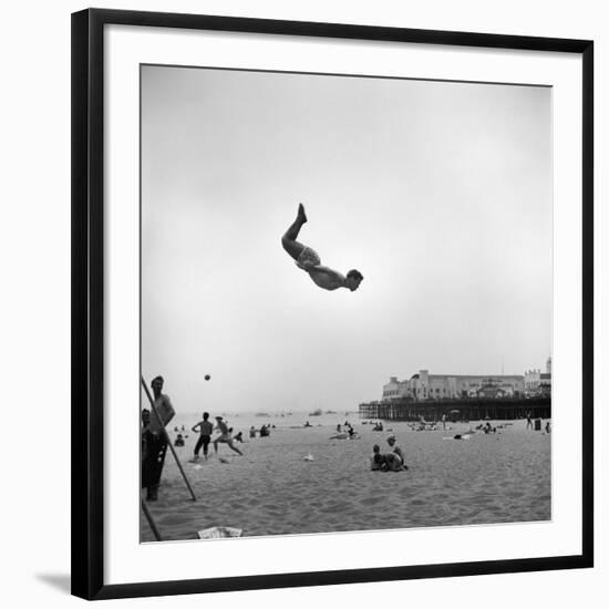 Man Flying Off a Trampoline at Santa Monica Beach-Loomis Dean-Framed Photographic Print