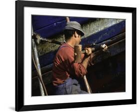 Man Hammering, Morocco-Michael Brown-Framed Photographic Print