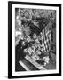 Man Hanging the American Flag Out of the Osteopath's Office Window During WWII-George Strock-Framed Photographic Print