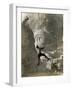 Man Hangs Onto Eye at Mount Rushmore-null-Framed Photographic Print