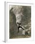 Man Hangs Onto Eye at Mount Rushmore-null-Framed Photographic Print