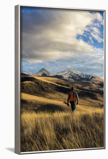 Man Hikes While Upland Bird Hunting In Montana-Hannah Dewey-Framed Photographic Print