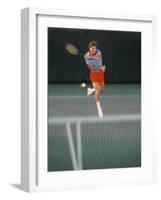 Man Hitting Tennis Ball-Bill Bachmann-Framed Photographic Print