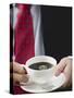 Man Holding Cup of Coffee-null-Stretched Canvas