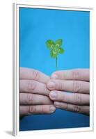 Man Holding Four-Leaf Clover-Joe Petersburger-Framed Premium Photographic Print