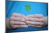 Man Holding Four-Leaf Clover-Joe Petersburger-Mounted Photographic Print