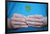 Man Holding Four-Leaf Clover-Joe Petersburger-Framed Photographic Print