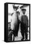 Man Holding Life Size King Salmon - Alaska-Lantern Press-Framed Stretched Canvas