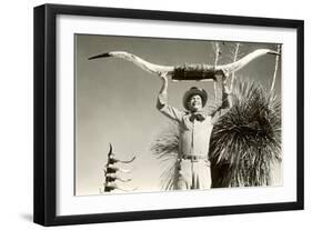 Man Holding Longhorns-null-Framed Art Print