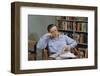 Man Holding Newspaper While Thinking-William P. Gottlieb-Framed Photographic Print