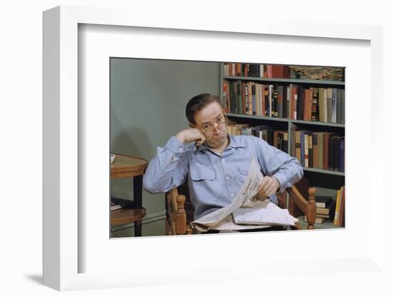 Man Holding Newspaper While Thinking-William P. Gottlieb-Framed Photographic Print