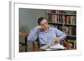 Man Holding Newspaper While Thinking-William P. Gottlieb-Framed Photographic Print