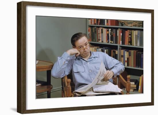 Man Holding Newspaper While Thinking-William P. Gottlieb-Framed Photographic Print