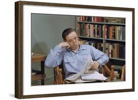 Man Holding Newspaper While Thinking-William P. Gottlieb-Framed Photographic Print