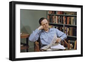 Man Holding Newspaper While Thinking-William P. Gottlieb-Framed Photographic Print