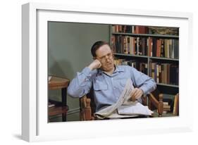 Man Holding Newspaper While Thinking-William P. Gottlieb-Framed Photographic Print