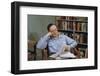 Man Holding Newspaper While Thinking-William P. Gottlieb-Framed Photographic Print