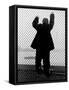 Man Holding Onto Fence at Mental Hospital as He Gazes at Boat on a River-Alfred Eisenstaedt-Framed Stretched Canvas