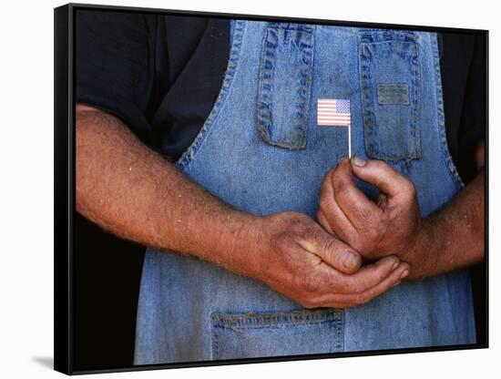 Man Holding Small American Flag-Bob Rowan-Framed Stretched Canvas