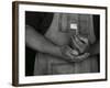 Man Holding Small American Flag-Bob Rowan-Framed Photographic Print