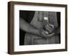 Man Holding Small American Flag-Bob Rowan-Framed Photographic Print