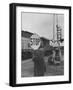 Man Holding Stop Sign by Hand While Automatic Gate Is Being Repaired-null-Framed Photographic Print