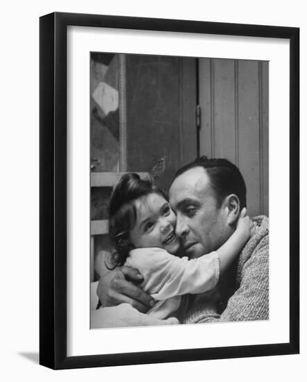 Man Hugging His Daughter-Nat Farbman-Framed Photographic Print