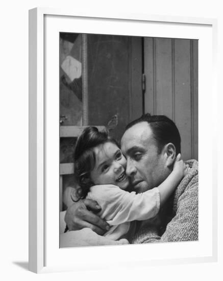 Man Hugging His Daughter-Nat Farbman-Framed Photographic Print