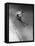 Man in a Vest in Mid-Air as He Skis Down a Steep Mountain-null-Framed Stretched Canvas
