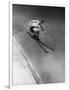 Man in a Vest in Mid-Air as He Skis Down a Steep Mountain-null-Framed Photographic Print