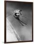 Man in a Vest in Mid-Air as He Skis Down a Steep Mountain-null-Framed Photographic Print