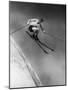 Man in a Vest in Mid-Air as He Skis Down a Steep Mountain-null-Mounted Photographic Print