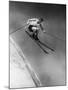 Man in a Vest in Mid-Air as He Skis Down a Steep Mountain-null-Mounted Photographic Print