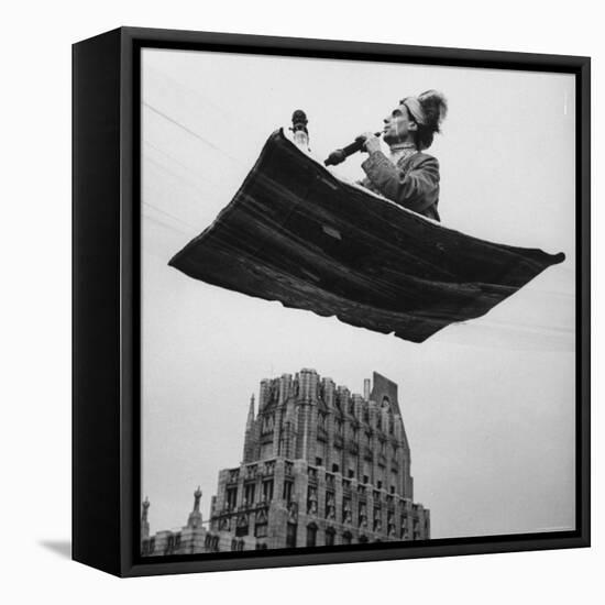 Man in Arabic Dress, Smoking a Water Cooled Pipe, is Comfortably Sitting on a Magic Carpet-Andreas Feininger-Framed Stretched Canvas