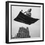 Man in Arabic Dress, Smoking a Water Cooled Pipe, is Comfortably Sitting on a Magic Carpet-Andreas Feininger-Framed Photographic Print