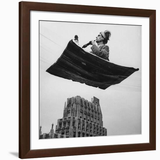 Man in Arabic Dress, Smoking a Water Cooled Pipe, is Comfortably Sitting on a Magic Carpet-Andreas Feininger-Framed Photographic Print