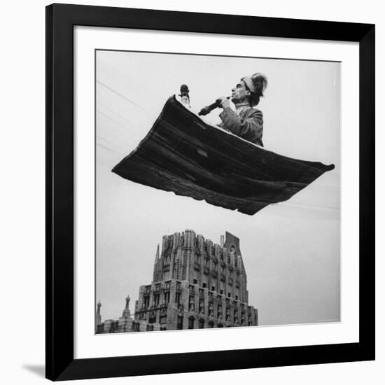 Man in Arabic Dress, Smoking a Water Cooled Pipe, is Comfortably Sitting on a Magic Carpet-Andreas Feininger-Framed Photographic Print