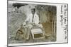 Man in Garden Chair with Pet Dog-null-Mounted Photographic Print