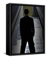 Man in Suit and Bowler Hat Standing in Front of Skyscraper-null-Framed Stretched Canvas