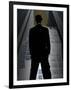 Man in Suit and Bowler Hat Standing in Front of Skyscraper-null-Framed Photographic Print