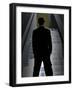 Man in Suit and Bowler Hat Standing in Front of Skyscraper-null-Framed Photographic Print