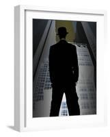 Man in Suit and Bowler Hat Standing in Front of Skyscraper-null-Framed Photographic Print