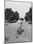 Man in Suit Riding Bicycle-Philip Gendreau-Mounted Photographic Print