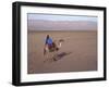 Man in Traditional Dress Riding Camel, Morocco-Merrill Images-Framed Photographic Print