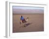 Man in Traditional Dress Riding Camel, Morocco-Merrill Images-Framed Photographic Print