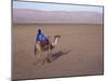 Man in Traditional Dress Riding Camel, Morocco-Merrill Images-Mounted Photographic Print